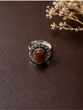 Silver Ring with Brown Stone and Floral Halo